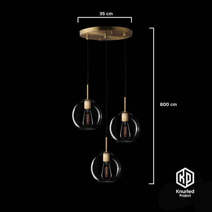 A brass chandelier with three pendant lights and globe shape light shades and product measurements