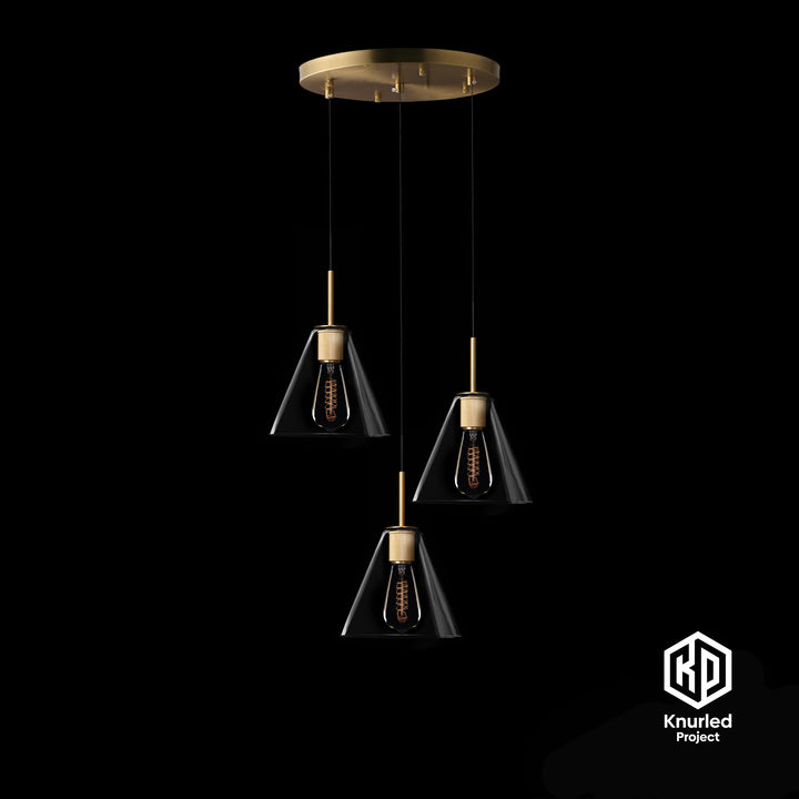 A brass chandelier with three pendant lights and cone shaped light shades