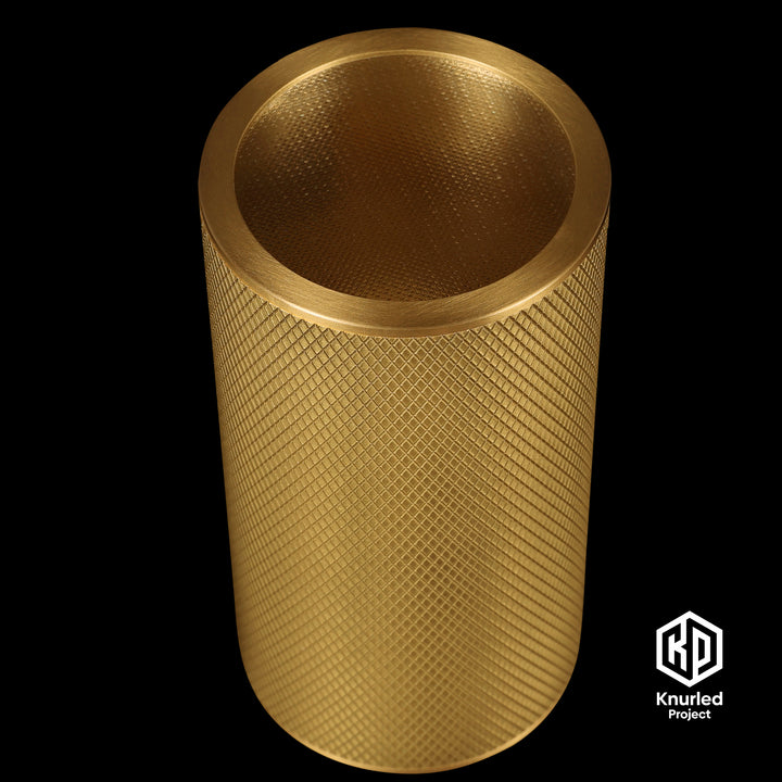 Brass directional light by The Knurled Project on a black background