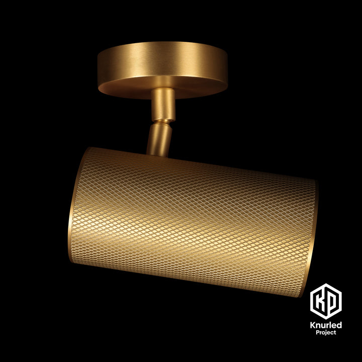 Brass directional light by The Knurled Project on a black background