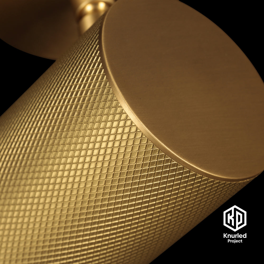 Brass directional light by The Knurled Project on a black background