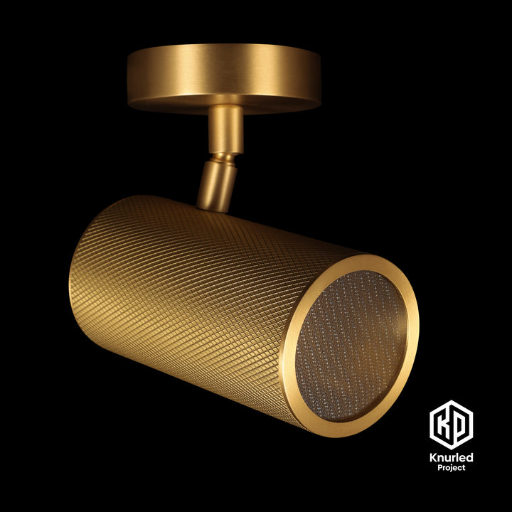 Brass directional light by The Knurled Project on a black background