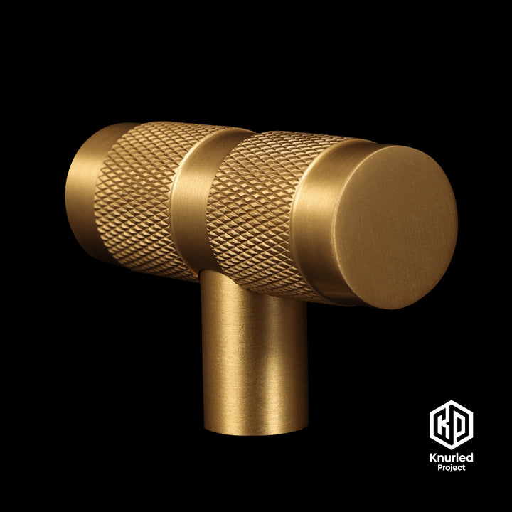 Brass T Bar handle by The Knurled Project on a black background