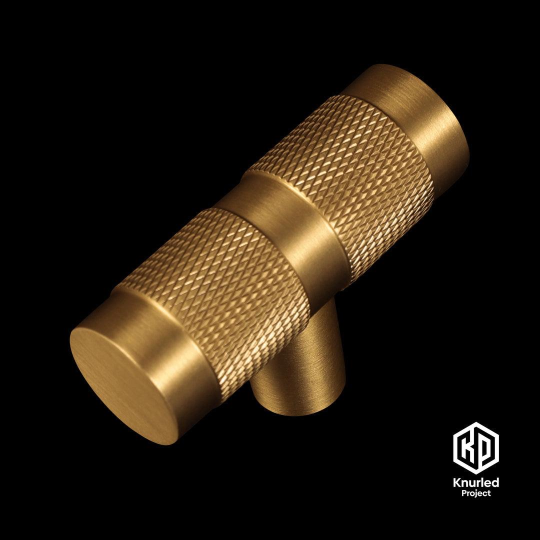 Brass T Bar handle by The Knurled Project on a black background