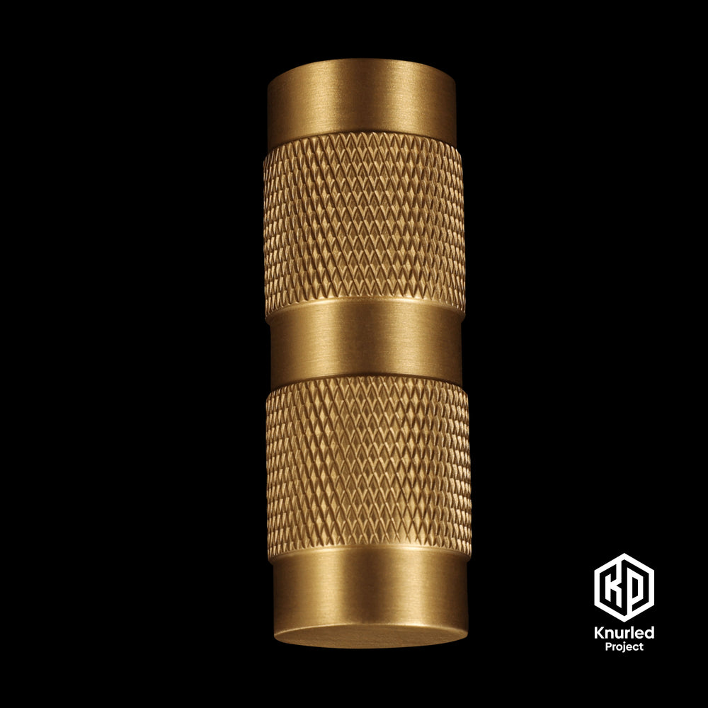 Brass T Bar handle by The Knurled Project on a black background