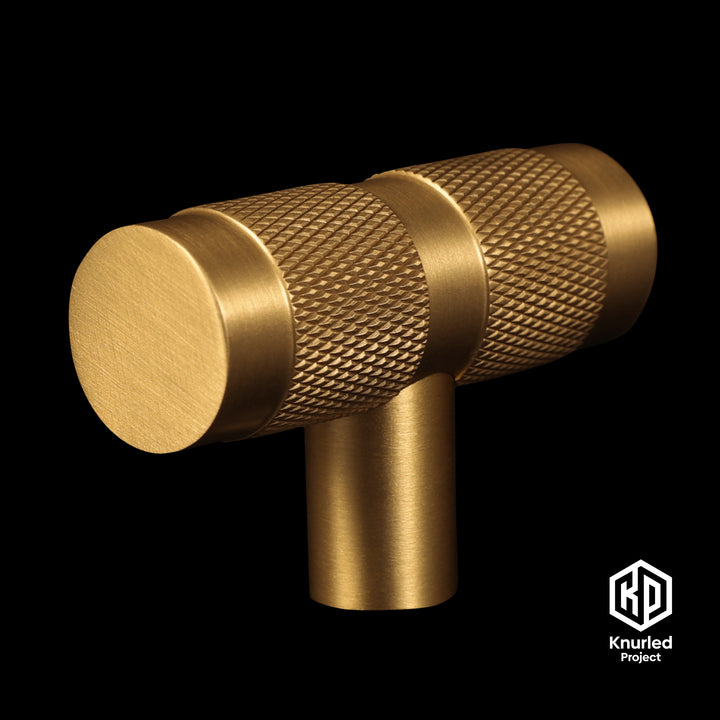 Brass T Bar handle by The Knurled Project on a black background