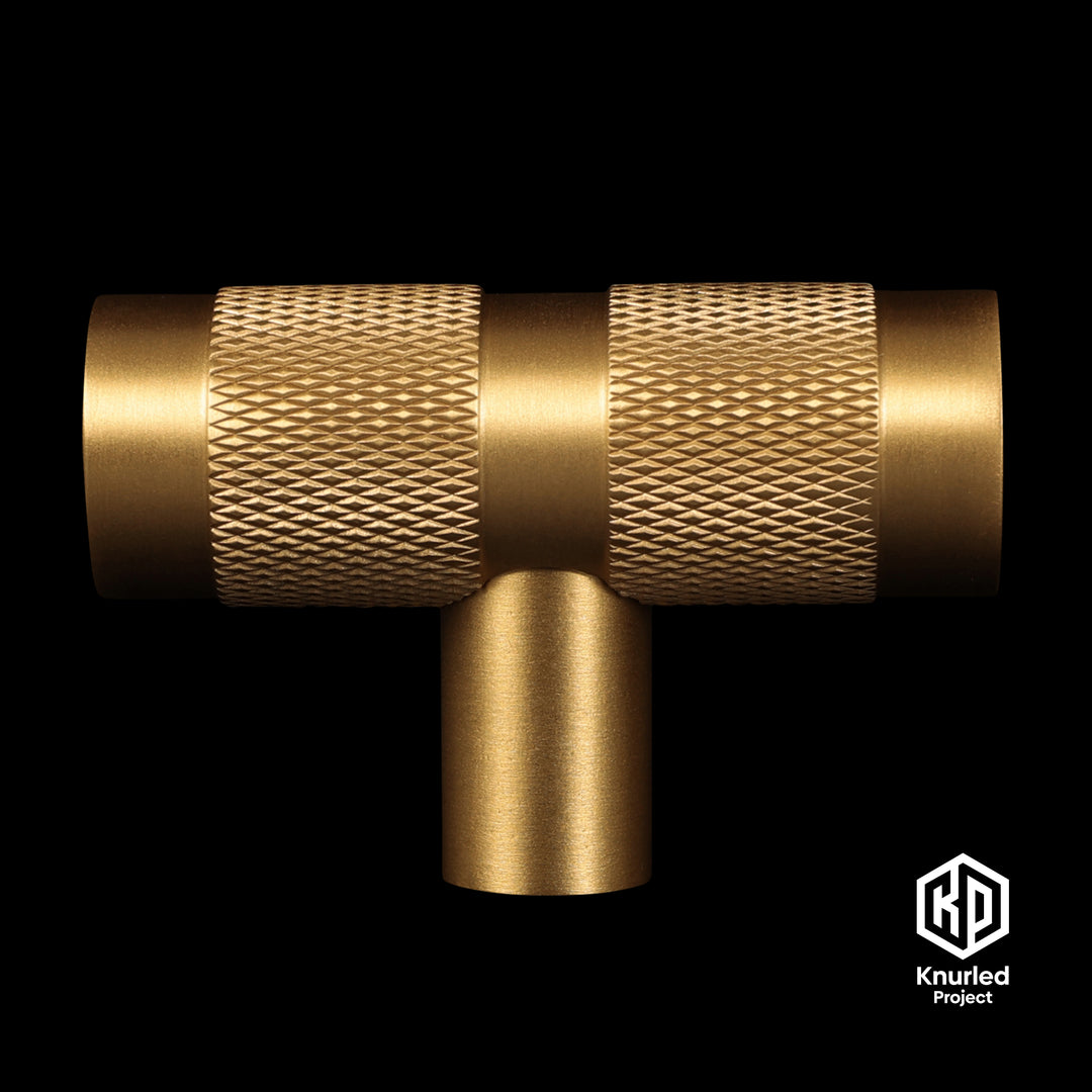 Brass T Bar handle by The Knurled Project on a black background