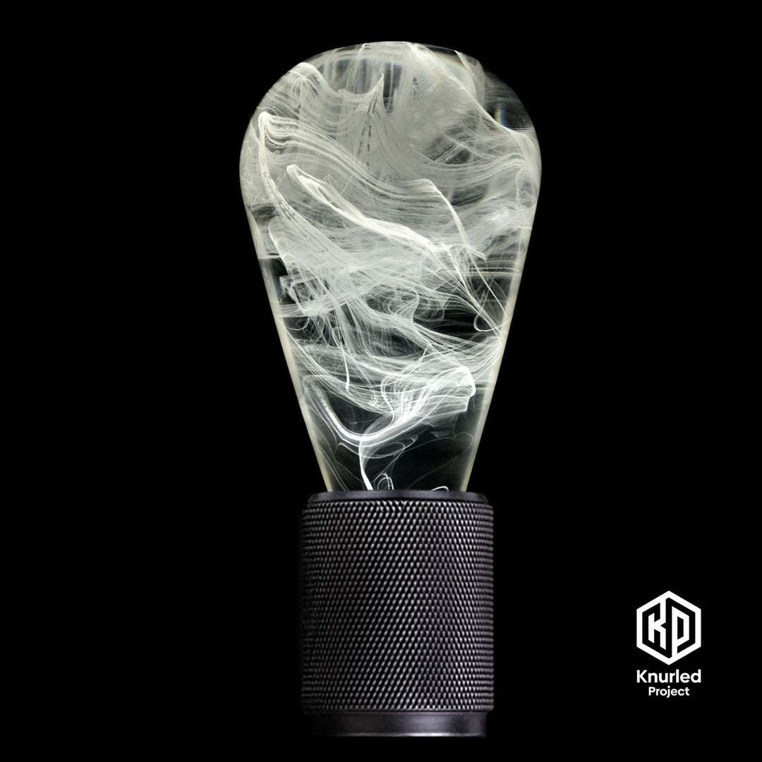 White smoked lava mood bulb in matte black holder