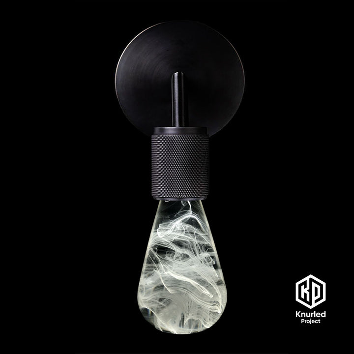 White smoked lava mood bulb in a matte black wall light